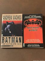 Front covers of two Batman pocketbooks: 'Batman: The Ultimate Evil' and 'Batman & Robin' novelization.