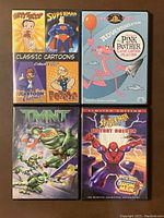 Front view of the four DVD cases showing their cover artwork.