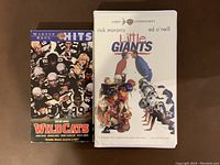Front view of Wildcats and Little Giants VHS movie cases showing cover art and titles.