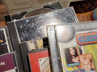 Close-up of signed Supertramp CD with visible autograph on the cover.