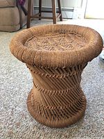 Side view showing bamboo frame with diagonal rod arrangement wrapped in jute fiber