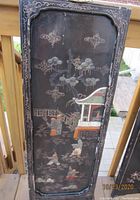 Single panel showing detailed incised play scene with children and pavilion and semiprecious stone inlays on black lacquer background.