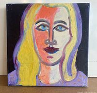 Front view of small square oil portrait of a woman with blonde hair and blue eyes in stylized form.