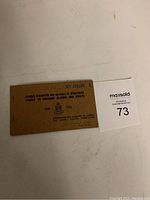 Photo of the booklet cover showing permit number 376265 and stamped text indicating permit to purchase alcohol and spirits 1945-1946.