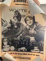 Full view image of the Bob and Doug McKenzie poster with visible wear and curled corner.