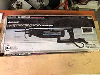 Box of Sears/Craftsman electronic reciprocating saw with product image and branding on top and visible wear.