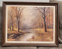 Photo showing full lithograph artwork framed, depicting autumn forest with stream.