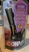 Photo of new and sealed Conair ceramic 3/4 inch ultra slim hair straightener in original packaging, showing product features and brand name.