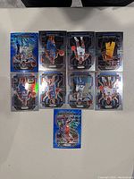 Photo shows 9 Oklahoma City Thunder NBA trading cards including Josh Giddey rookie card arranged on a white surface.