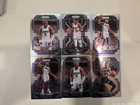 Six Sacramento Kings basketball trading cards from Panini Prizm featuring De'Aaron Fox, Davion Mitchell, Tyrese Haliburton, and Chris Webber.