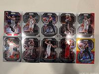 Photo showing 10 San Antonio Spurs NBA basketball cards featuring various players in their team uniforms.