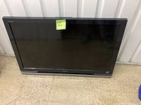 Front view of Sony Bravia TV showing screen and bezel, no remote or stand visible.