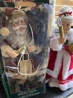 Mr Claus holiday figure dressed in burgundy and beige outfit inside original box