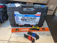 Mastercraft socket and tool set case with orange manual level, two sets of Allan keys in front