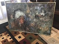 Full view of framed art showing Native American chief and tipis in background.