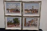 Four framed oil on board paintings arranged in a square, showing the overall condition and framing.