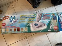 Photo of the H2O Mop steam cleaner box with product image and wattage details.