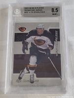 Front of graded Ilya Kovalchuk rookie hockey card showing player image and descriptive text, with grading label visible at top
