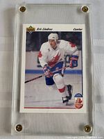 Eric Lindros Canada Cup rookie hockey card inside screw-down protective case, showing front image of card in mint condition.