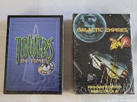 Two sealed game card decks: Towers in Time and Galactic Empires Primary Edition Basic Deck B.