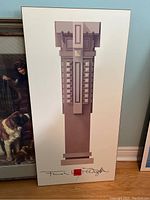 Full view of Frank Lloyd Wright architectural poster on white backing, showing the entire piece with Wright's signature and red square at the bottom.