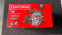Front side of sealed Craftsman V20 circular saw box showing model and key features.