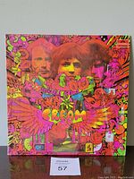 Front cover of Cream Disraeli Gears vinyl LP in colorful psychedelic artwork and shrink wrap