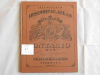 Front cover showing brown hardcover with printed crest, title and imprint