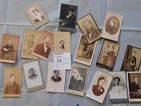 Top view of all Carte de Visite photographs laid on flat surface showing full lot spread