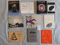 Overview of all 10 books in the lot showing variety of covers and titles about Inuit and First Nations art.