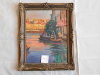 Full view of framed oil painting depicting a harbor scene at sunset