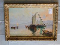 Full frontal view of painting in ornate gilt frame