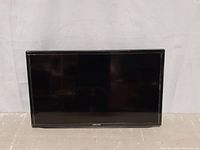 Front view of Samsung HDTV screen, showing black frame and intact screen.