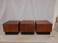 Three cube tables arranged side by side