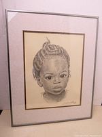 Frontal view of the framed charcoal print showing the full portrait and frame