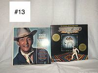 Front covers of Dean Martin Country Style and Saturday Night Fever vinyl records side by side.