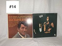 Front covers of Dean Martin Hits and Sonny & Cher Live vinyl records side by side