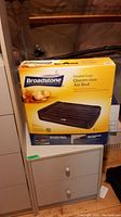 Front view of the Broadstone double-high queen-size air bed box depicting the product image and basic specs.