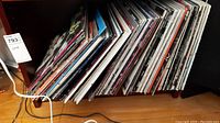Shelf with multiple vinyl record spines