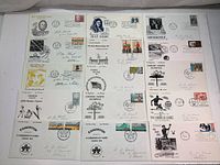 Photo of multiple first day cover envelopes arranged in rows showing Canadian historical persons, sports, Olympic events, and commemorative stamps.