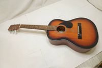 Full front and side view of the sunburst Denver acoustic guitar showing body and neck