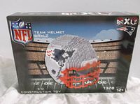 Original boxed set front showing Brxlz New England Patriots NFL helmet 3D construction toy, 1328 pieces