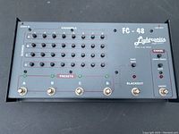 Lightronics FC-48 stage controller top view showing channels, presets, footswitches, and control knobs