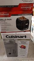 Boxes for Sunbeam toaster and Cuisinart yogurt and ice cream maker placed together