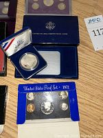 Commemorative presentation cases and coin collecting guide