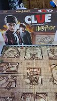 Closed box with Harry Potter Clue branding showing images of Harry Potter and Hermione on the front.