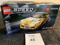 Front of box showing the Lego Speed Champions Toyota GR Supra set number 76901, with 299 pieces, recommended age 7+