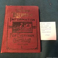 Front cover of the 1903 edition of Dr. Chase's Recipes or Information for Everybody, enlarged and improved edition, red leather-like cover with gold and black text and image