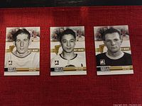 Photo showing three hockey cards side by side featuring Elmer Lach, Larry Kwong, and Ted Kennedy from the 'Heroes and Prospects' Key Hero series.
