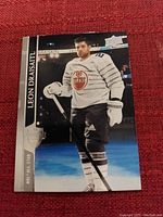 Photo of a Leon Draisaitl hockey card by Upper Deck showing him in Edmonton Oilers All-Star uniform on ice.